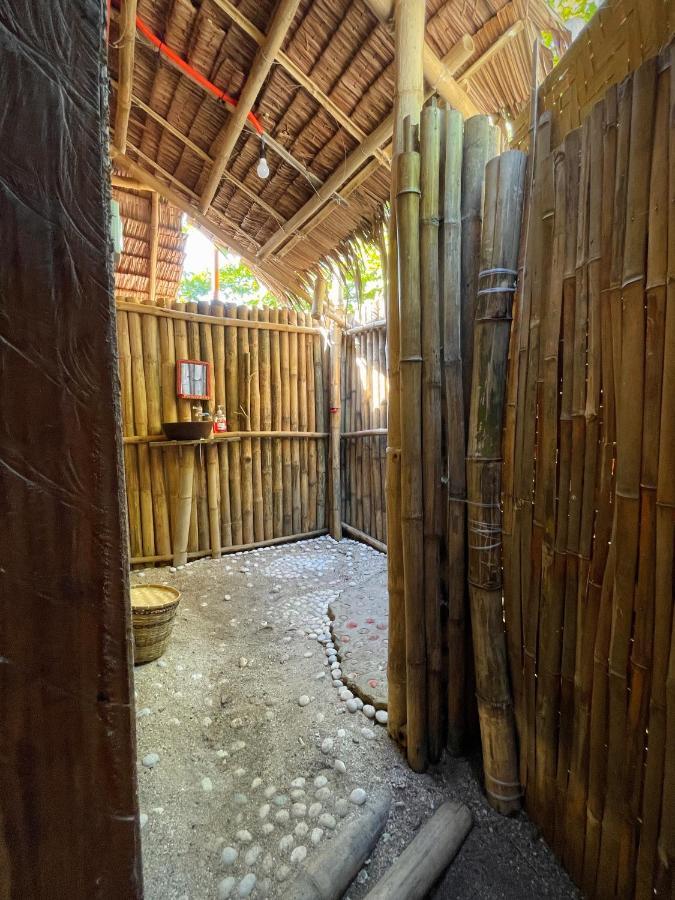 Albergue Tribal Huts Community Daanbantayan Habitación foto