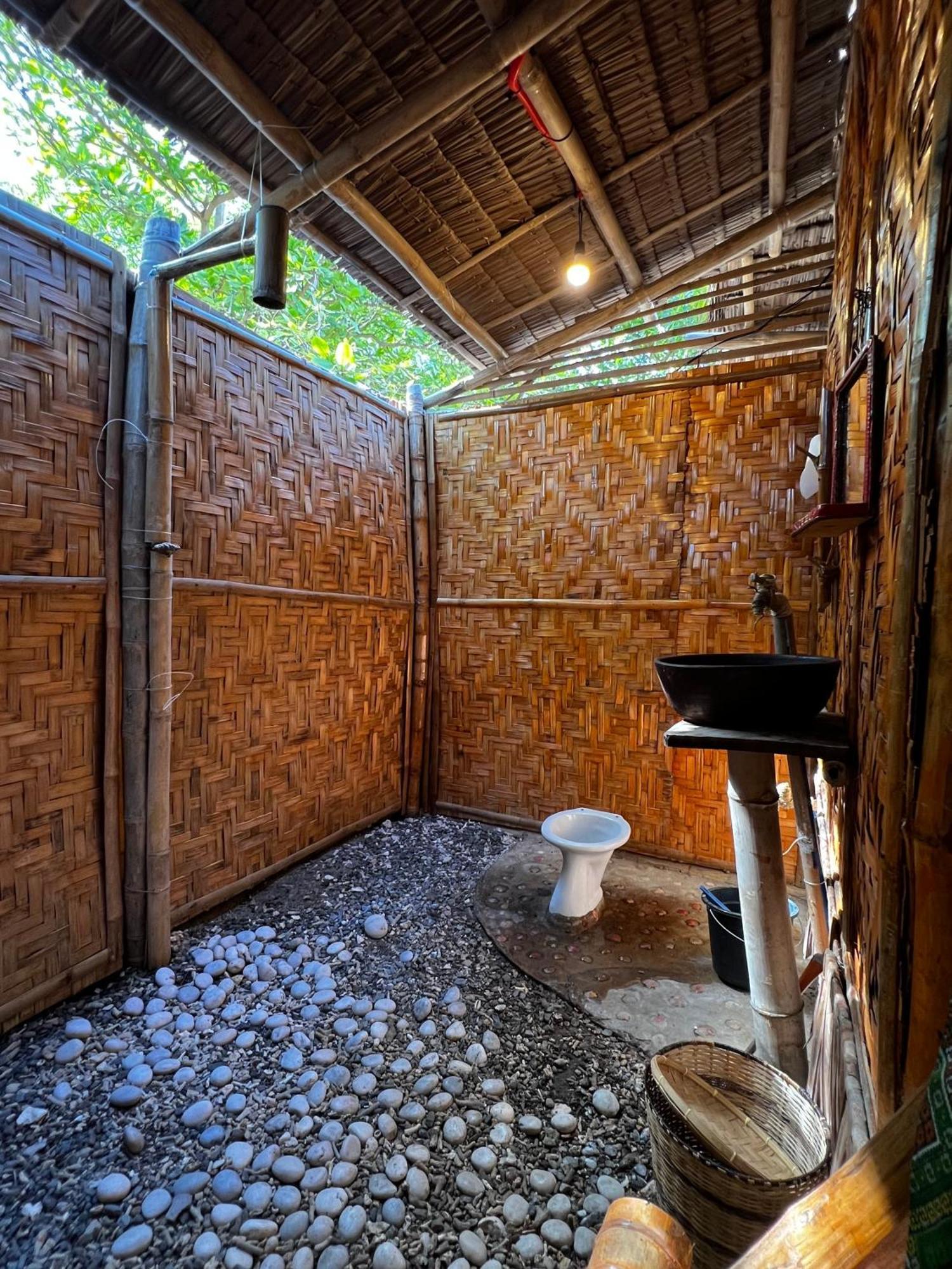 Albergue Tribal Huts Community Daanbantayan Habitación foto