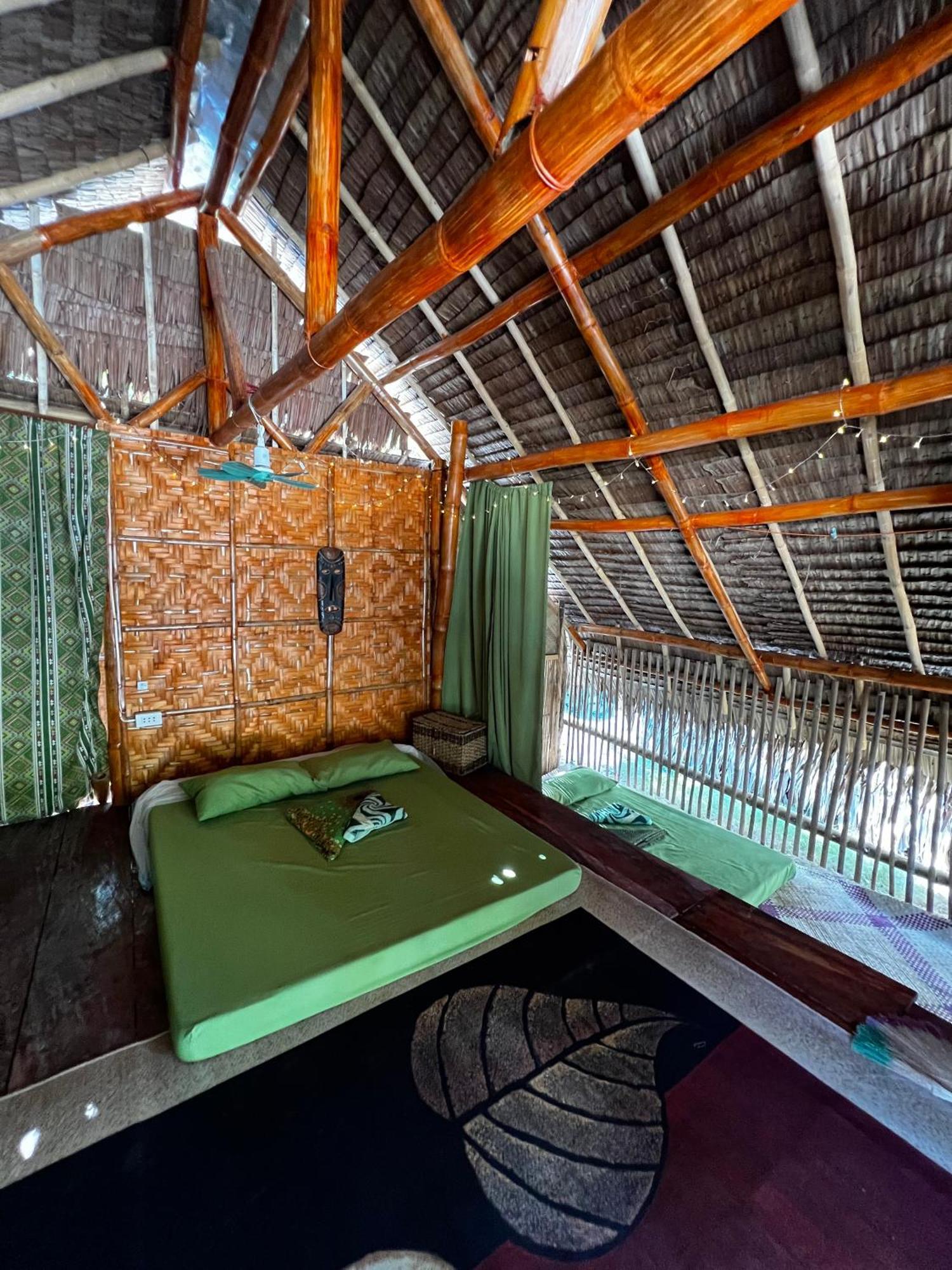 Albergue Tribal Huts Community Daanbantayan Habitación foto