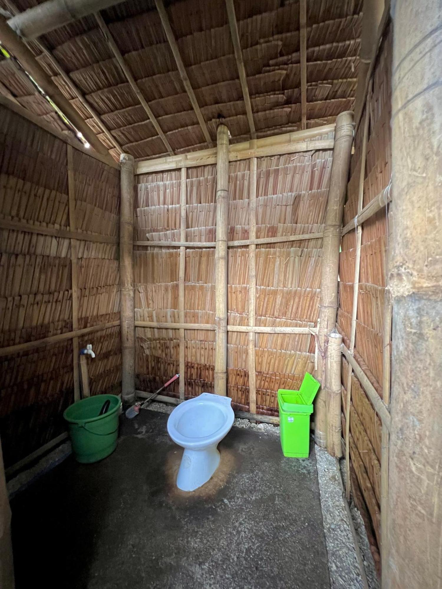 Albergue Tribal Huts Community Daanbantayan Habitación foto